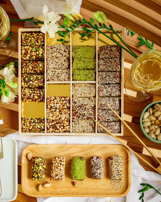 Wooden Platter filled with Date Rolls, 900g